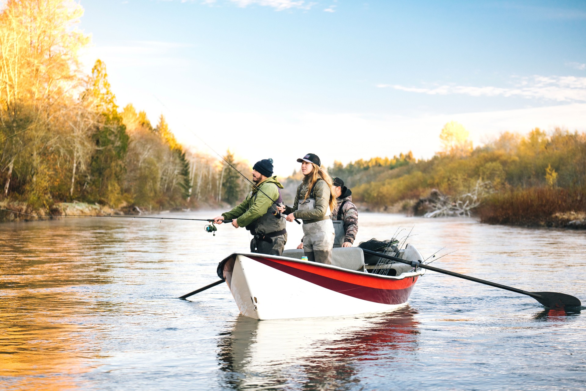 Young couple on guided drift fishing trip on river