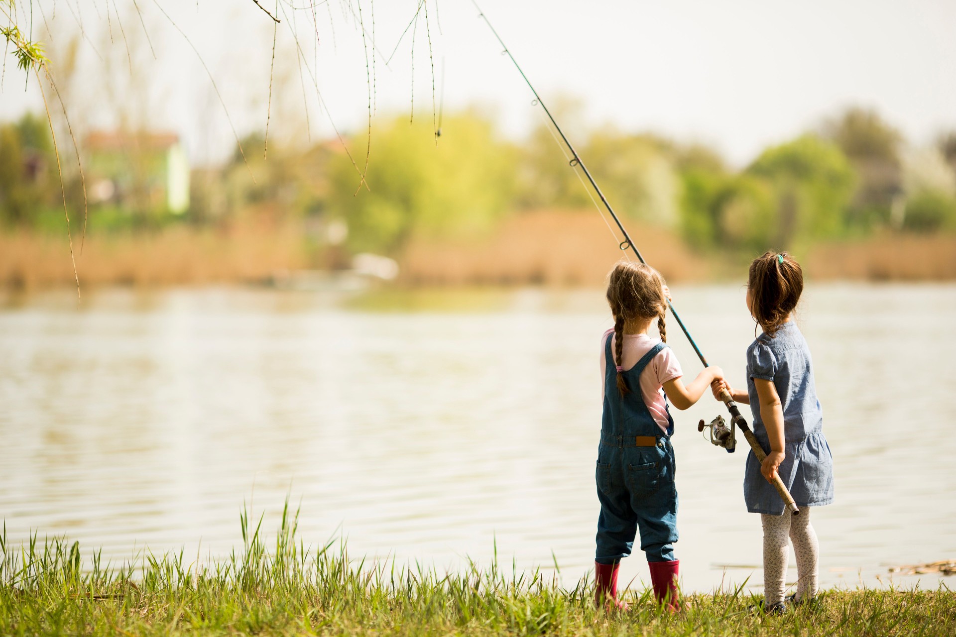 Two little girls fishing